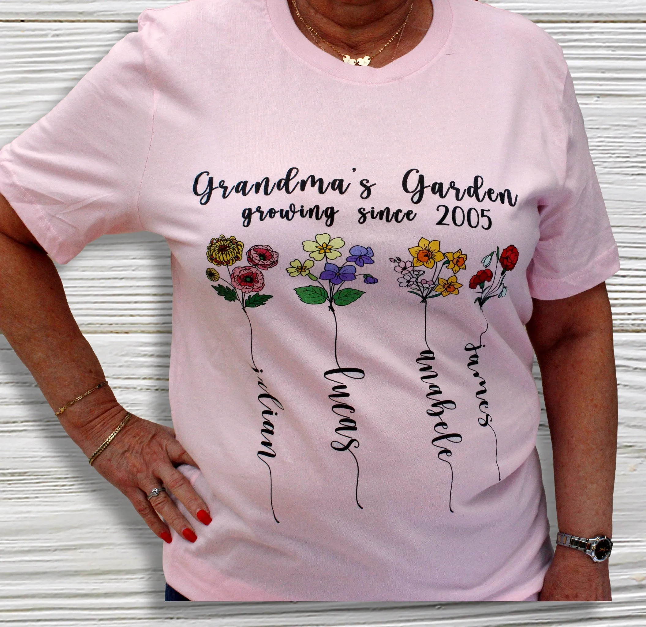 Grandma shirt, Warm Grandma's heart with personalized love! Our Grandma's  garden Shirt with kid's names – a cherished keepsake.