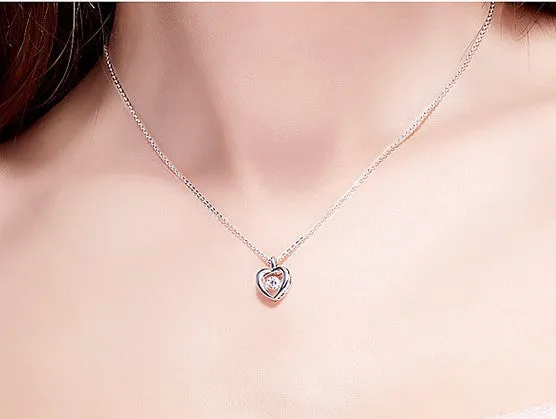 Sterling silver heart shaped dancing crystal necklace