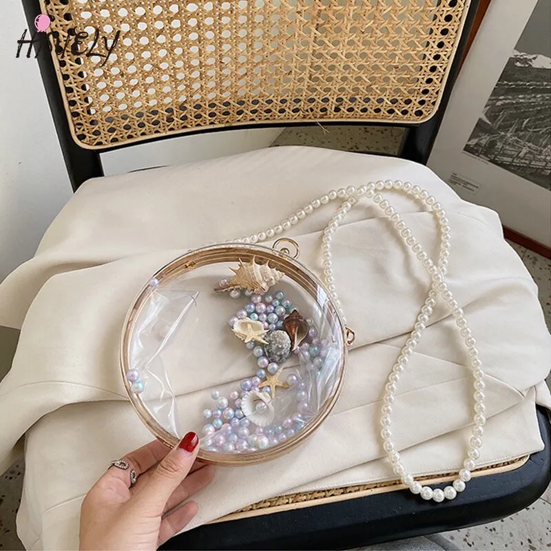 Transparent pearl chain shoulder bag